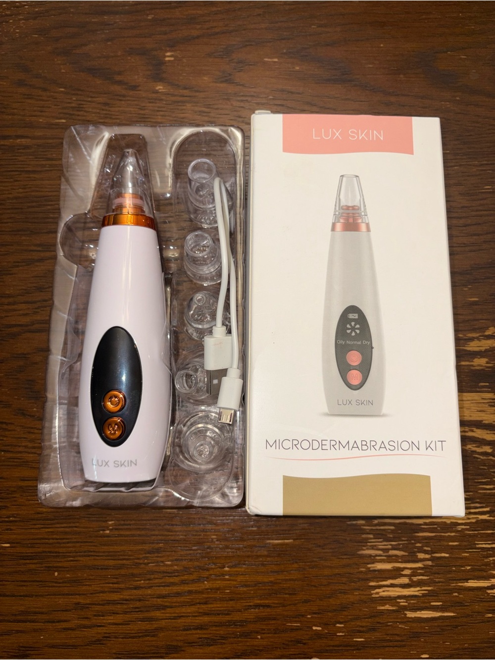 White and Rose Gold Microdermabrasion Pore Cleaner